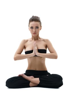 Yoga. Image of beautiful girl sitting in lotus position