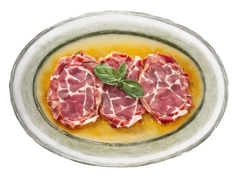 Saltimbocca veal with sage and prosciutto served on a transparent glass plate Italian classic tender. Food isolated on transparent background.