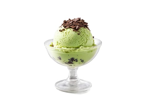Ice cream matcha green tea scoops with chocolate shavings in a transparent glass cup earthy. Food isolated on transparent background.