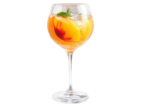 Nectarine soda in a wine glass nectarine slices and basil leaves vibrant orange splash in. Drink isolated on transparent background.