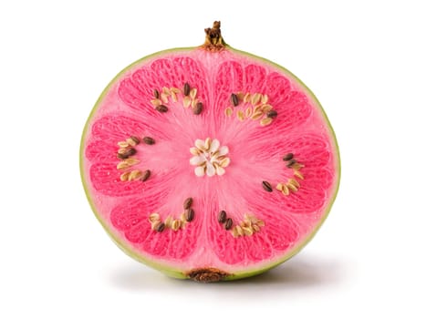 Smirking guava sliced in half revealing soft pink flesh speckled with seeds wisps of sweet. Fruits and berries isolated on transparent background.