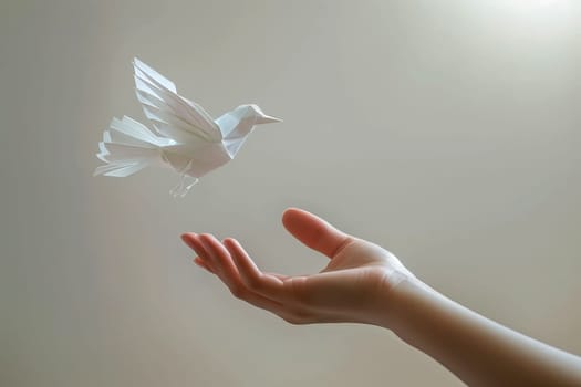 Origami Paper Bird Flight from Open Palm Symbolizing and Freedom to Dream. peach concept.