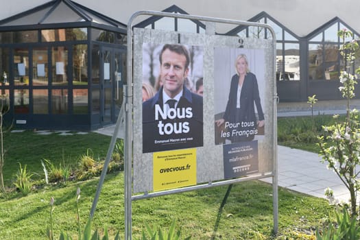 PARIS, FRANCE - APRIL 20, 2022 : The banners with candidates for President elections