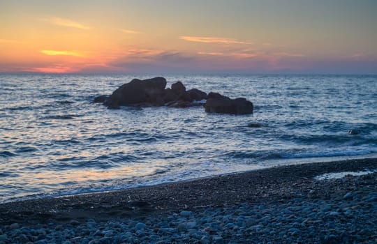 Rock stone stage in nature with sea beach seashore landscape and sunset summer sky 3