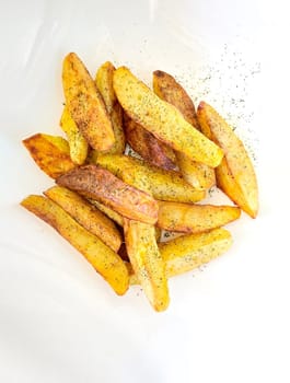 country-style potatoes on a white background, fast food