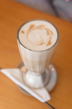 Latte in a glass glass, Breakfast in a cafe