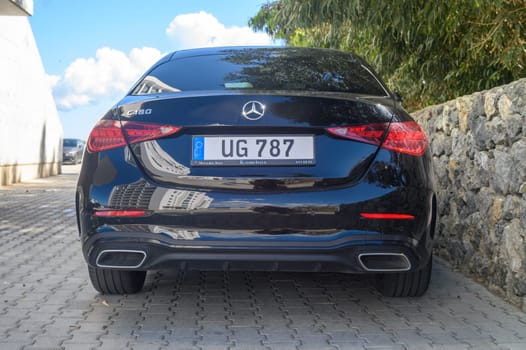 Gaziveren Cyprus 05.27.2024 - black Mercedes rear view in the parking lot 2