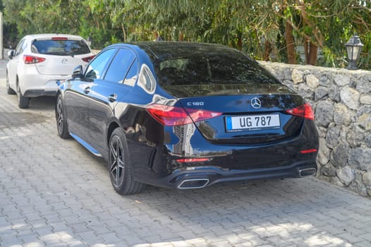 Gaziveren Cyprus 05.27.2024 - black Mercedes rear view in the parking lot 1