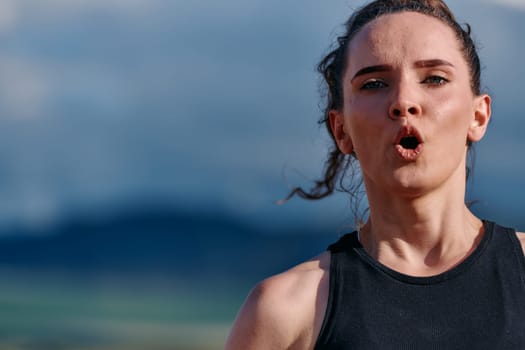 A woman takes a moment to rest and recuperate after an intense run, finding solace and rejuvenation in the tranquility of her surroundings.