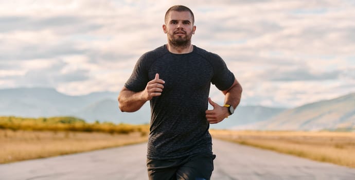 An athletic man jogs under the sun, conditioning his body for life's extreme challenges, exuding determination and strength in his preparation for the journey ahead