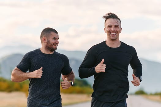 Two friends enjoy a jog together on a beautiful sunny day, embracing the companionship and joy of outdoor exercise