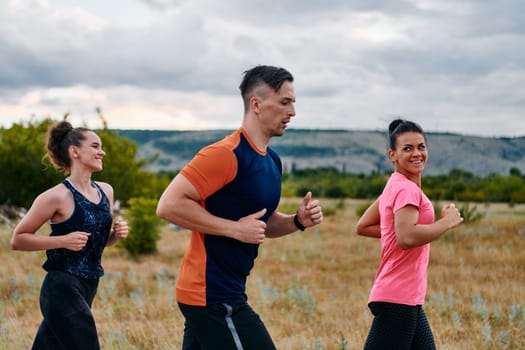 A professional athletic team as they train rigorously, running towards peak performance in preparation for an upcoming marathon.