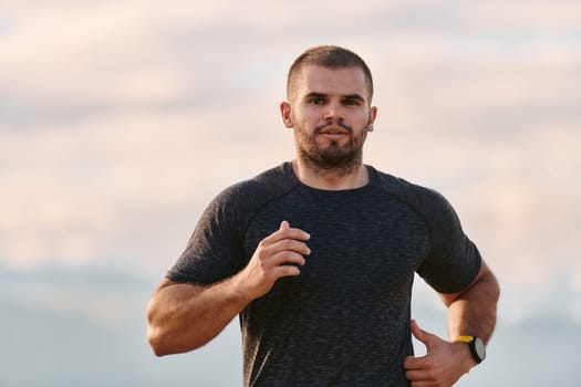 An athletic man jogs under the sun, conditioning his body for life's extreme challenges, exuding determination and strength in his preparation for the journey ahead