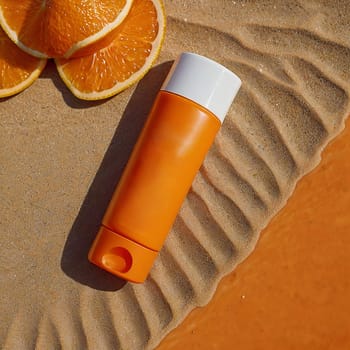 Orange bottle of cream without inscriptions. High quality photo. Sunscreen. Summer cream. Tanning product. Tanning remedy.