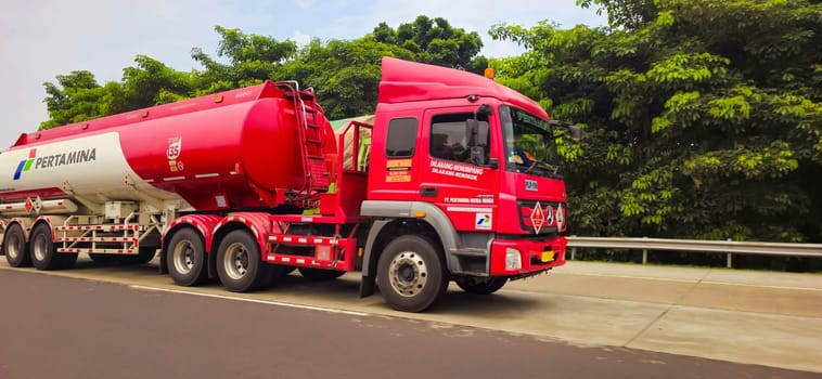 truck one of transportation mode making local commercial delivery at urban city and on the city streets in asia logistical transport system in Asian country Indonesia