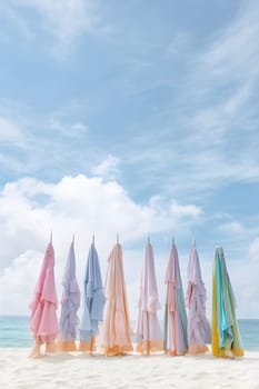 Tropical Getaway: Relaxing on the Beach with Umbrellas