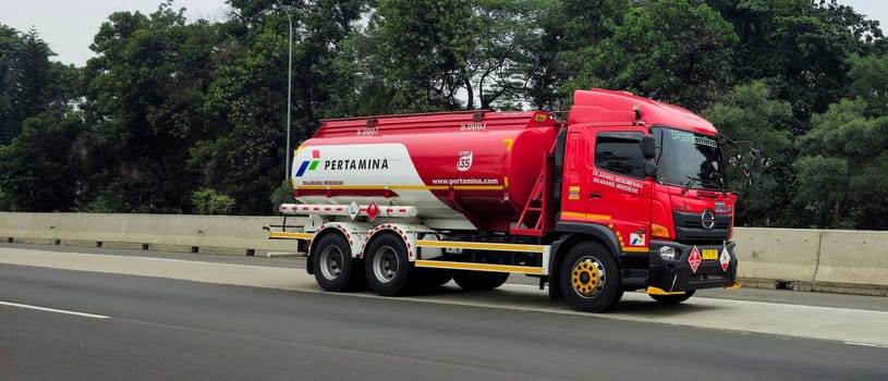 truck one of transportation mode making local commercial delivery at urban city and on the city streets in asia logistical transport system in Asian country Indonesia