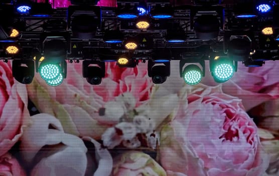 Beautiful retro pink, white, and green floral pattern background accented by dynamic stage lighting, perfect for adding a touch of nostalgia and elegance to any setting