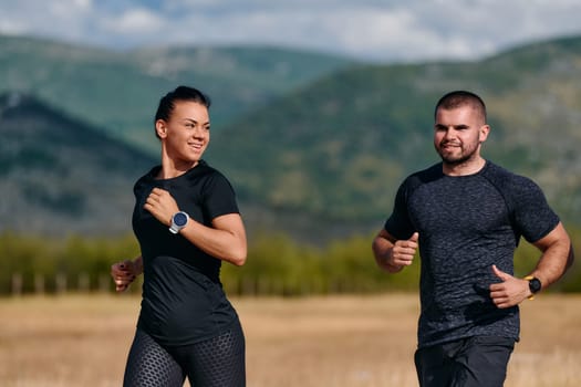 A couple embraces a healthy lifestyle by running together on a sunny day, exemplifying dedication to fitness and wellness in their partnership