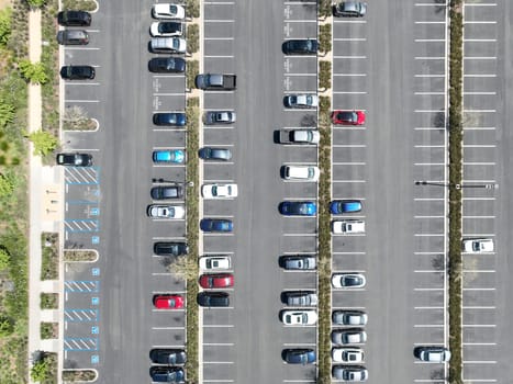 Open car parking lot viewed from above, aerial top view