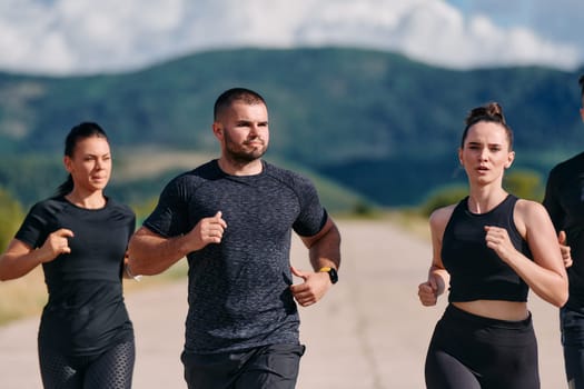 A professional athletic team as they train rigorously, running towards peak performance in preparation for an upcoming marathon.