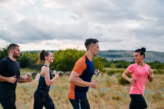 A professional athletic team as they train rigorously, running towards peak performance in preparation for an upcoming marathon.