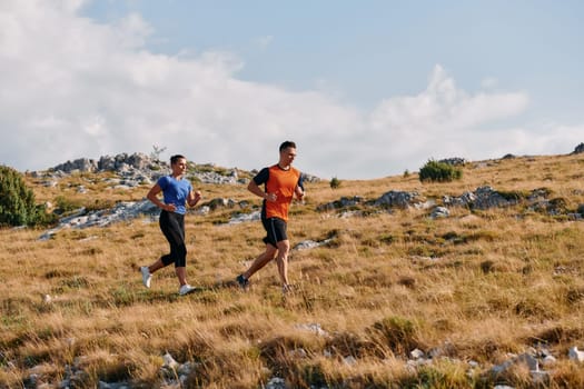 Couple conquer challenging mountain trails during an invigorating morning run.