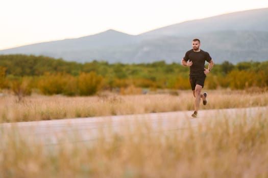 An athletic man jogs under the sun, conditioning his body for life's extreme challenges, exuding determination and strength in his preparation for the journey ahead