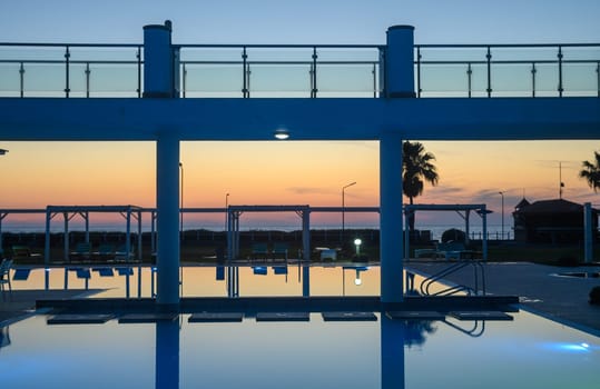 sunset reflected in the pool water 1