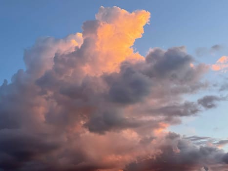 Dramatic orange grey purple sky and cloudy at sunset for background. High quality photo