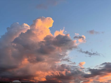 Dramatic orange grey purple sky and cloudy at sunset for background. High quality photo