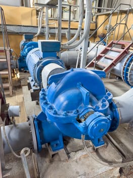 industrial pumps in the pumping room close-up. photo