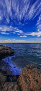 Red sea, Egypt. April 2024. Blue sea and sky background, blue shades horizon. White clouds on clear sky over sea water surface. Tranquil ocean with ripples. High quality photo