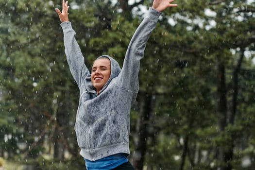 A stunning woman savors the tranquility of a rainy day after a rigorous run, finding solace and rejuvenation in the soothing rhythm of the falling rain.