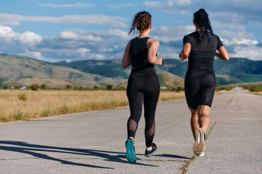 Two friends jog side by side on a sunny day, strengthening their bodies for life's extreme challenges, embodying the power of friendship and determination