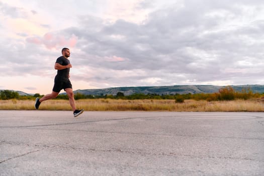 An athletic man jogs under the sun, conditioning his body for life's extreme challenges, exuding determination and strength in his preparation for the journey ahead