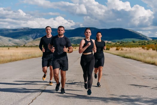 A professional athletic team as they train rigorously, running towards peak performance in preparation for an upcoming marathon.