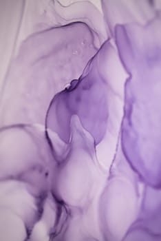 The picture is painted in alcohol ink. Abstraction will perfectly fit into a modern interior. Closeup of the painting. Colorful abstract painting background. Highly-textured paint.
