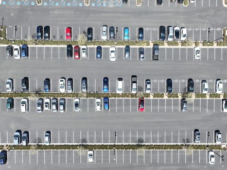 Open car parking lot viewed from above, aerial top view