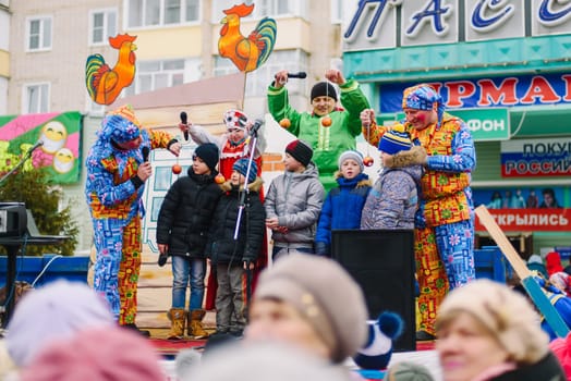 VICHUGA, RUSSIA - MARCH 12, 2016: Celebration of the Russian Slavic holiday of Maslenitsa. Contests and competitions on stage