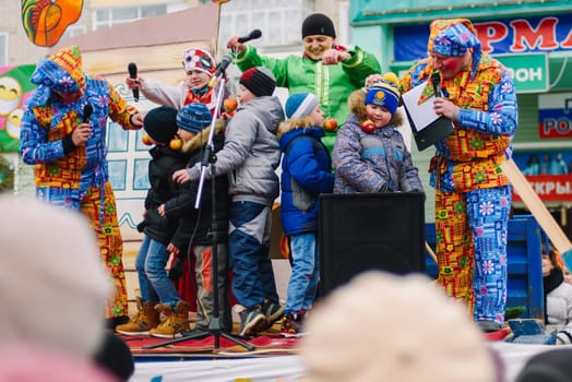 VICHUGA, RUSSIA - MARCH 12, 2016: Celebration of the Russian Slavic holiday of Maslenitsa. Contests and competitions on stage