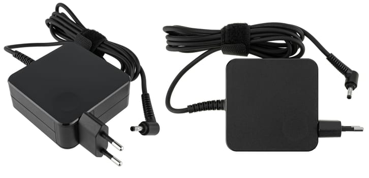 Power adapter for notebook computers on white background in insulation