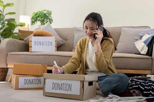 Volunteers sorting and donating clothes at home, contributing to community service and charity efforts, showcasing generosity and social responsibility.