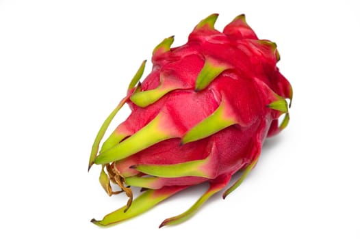 Delicious cut and whole dragon fruits (pitahaya) on white background