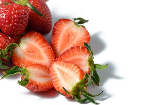 Strawberries isolated. Ripe sweet strawberries and half a berry on a white background. 3