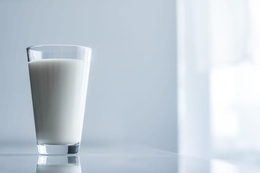 Dairy, healthy nutrition and breakfast concept - World Milk Day, full glass on marble table