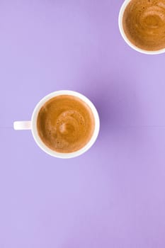 Breakfast, drinks and cafe menu concept - Coffee cup on purple background, top view flatlay