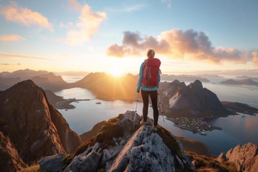 Man standing on top of mountain overlooking ocean and mountains at sunset during travel adventure journey trip