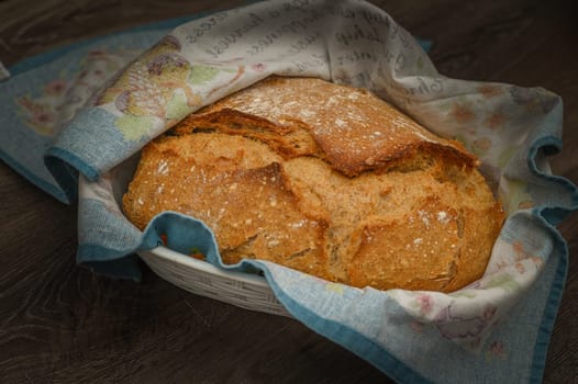 Homemade artisan bread on white wood rustic dinner table 3