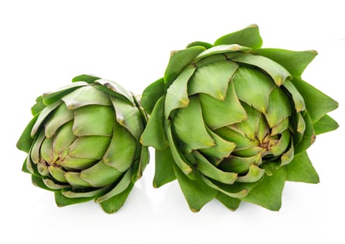 two green artichokes on a white background 1